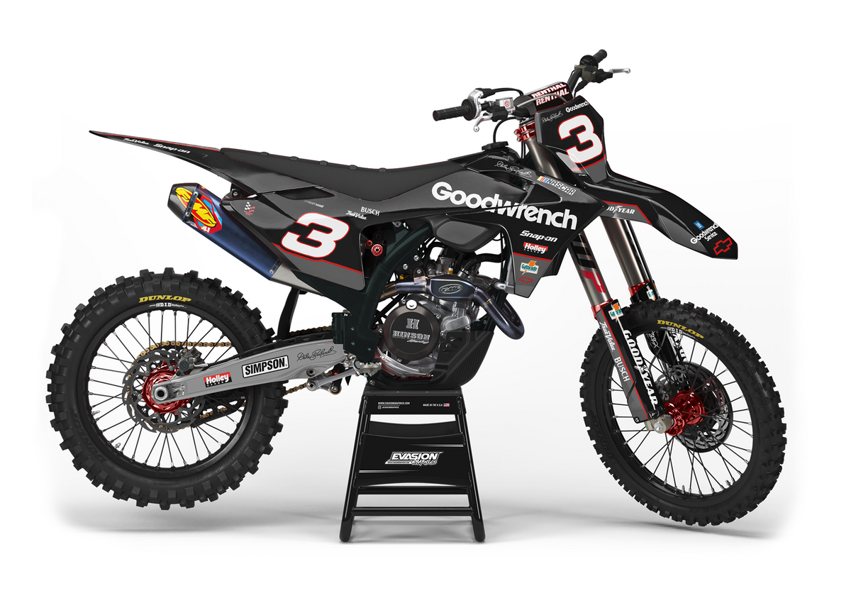 Gasgas dirt bike with black grey and red design side view