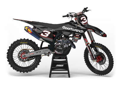 Gasgas dirt bike with black grey and red design side view
